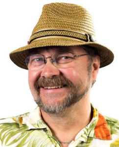 A man with a beard and glasses wearing a hat.